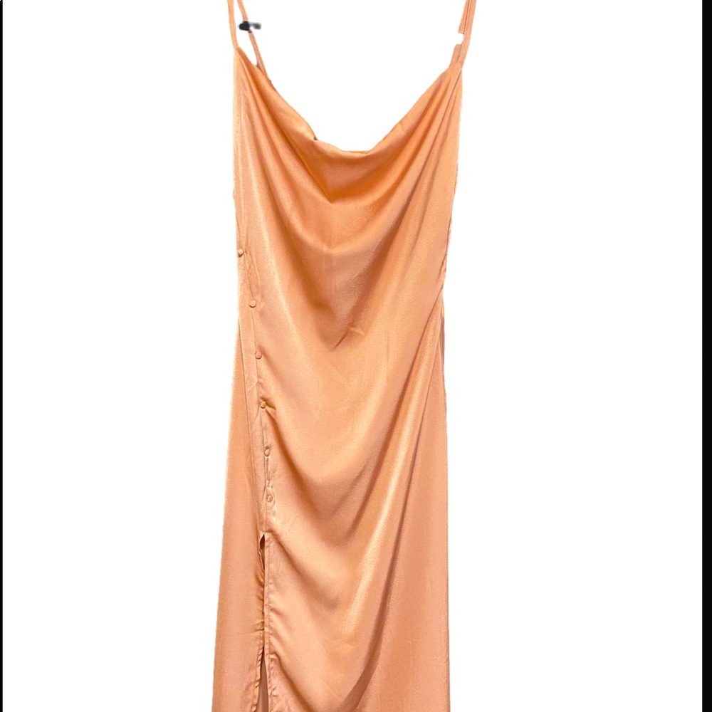 Pink silky dress.